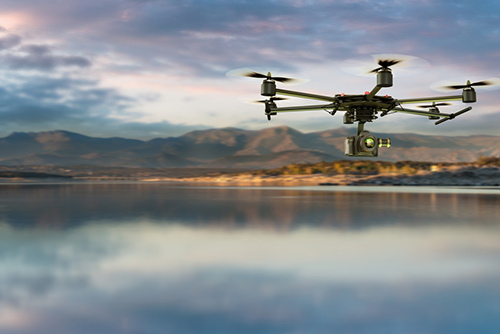An unmanned aerial vehicle surveys flood impacts